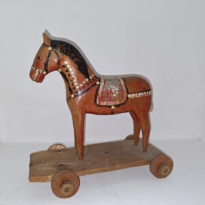 Drewniany, ludowy konik na kółkach, zabawka - wkrótce dostępna w sprzedaży